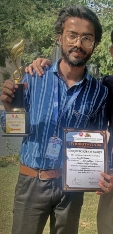 Trophy and certificate of merit at Vividhotsava 2025